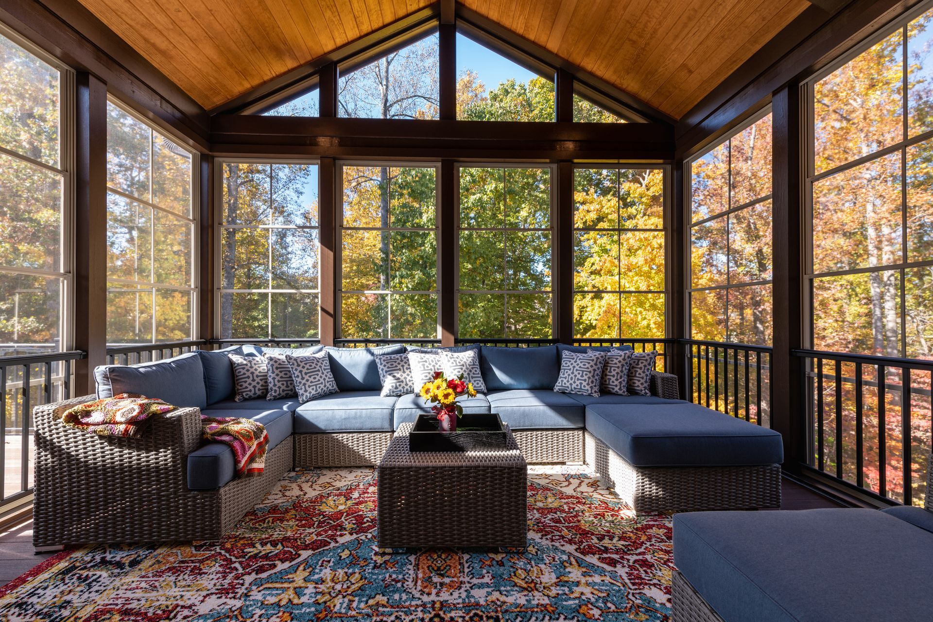 The interior of a finished sunroom looking out onto the garden